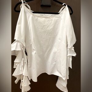 White blouse with ruffle/bell shaped sleeves in size M.  Worn only twice.